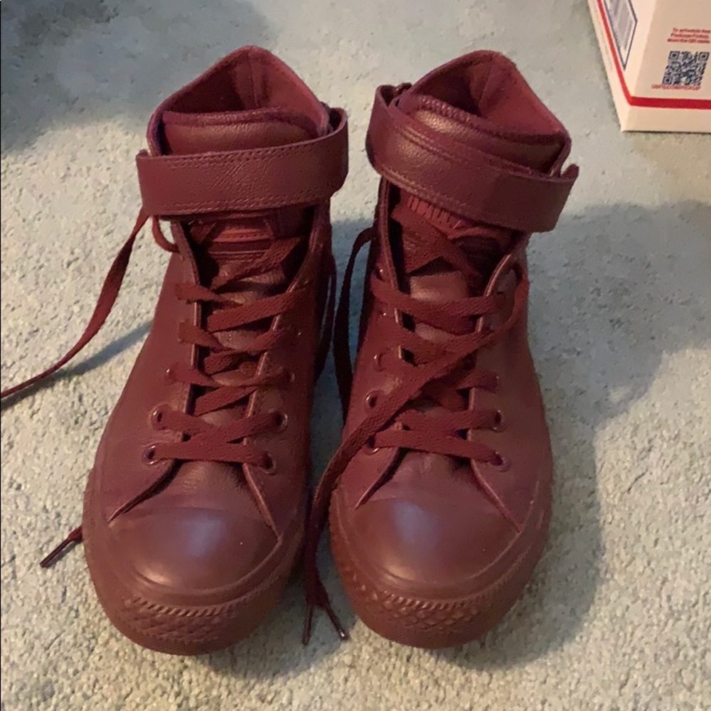 Red leather high top converse